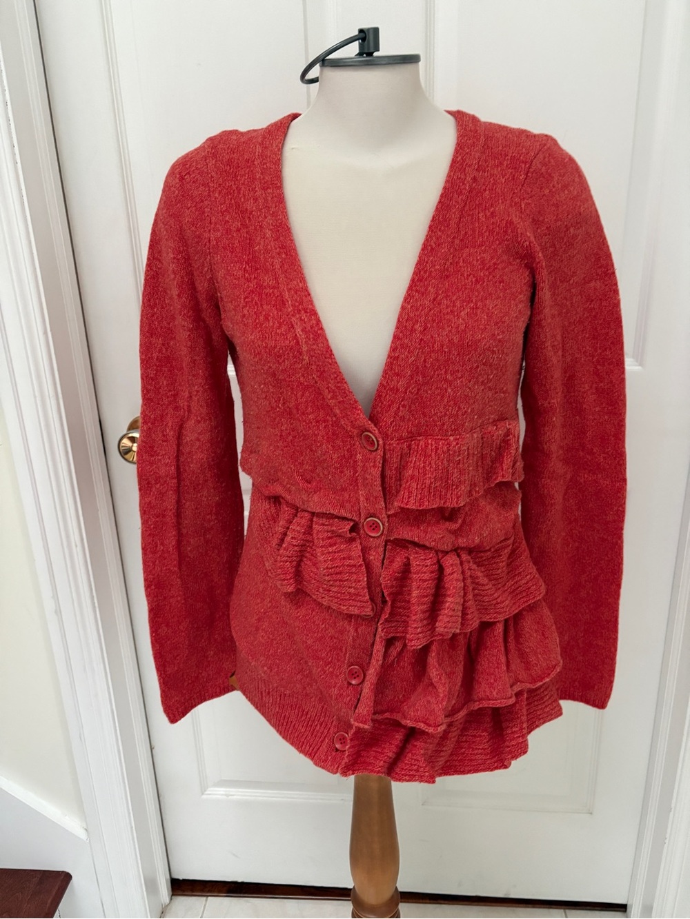 Ruffled cardigan sweater
